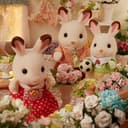 Sylvanian Families - La famille Lapin Chocolat - Set 4 figurines - Plongez dans l'univers de la famille Sylvanian - Figurines animaux miniatures - Jouet enfant 3 ans et + - 5655 - 4