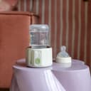 Bebeconfort Chauffe-biberon digital nomade, Chauffe-biberon portable pour bébé, Compact L6,5 x l6,5 x h8 cm, Poids léger (280 g), Écran digital, Batterie durable, Contrôle de la température - 9