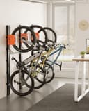monTEK Automatic Bicycle Lift - Vertical Bicycle Rack for Heavy Bicycles (up to 32 kg) - Easy Assembly, Space Saving Wall Mount for Garage, Shed, Home - For 24-29 Inch Tyres, E-Bikes - 9