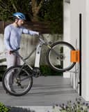 monTEK Automatic Bicycle Lift - Vertical Bicycle Rack for Heavy Bicycles (up to 32 kg) - Easy Assembly, Space Saving Wall Mount for Garage, Shed, Home - For 24-29 Inch Tyres, E-Bikes - 8